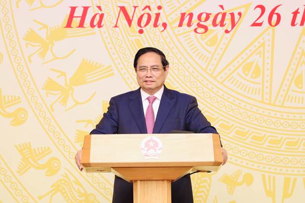 A person standing at a podium Description automatically generated